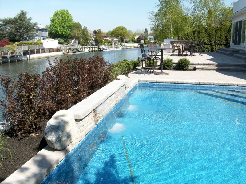 sheer descent water feature in pool